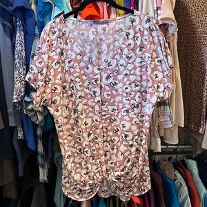 Stretchy pink patterned top. Dress up or down.